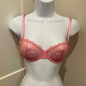 Pink lace, sheer bra.